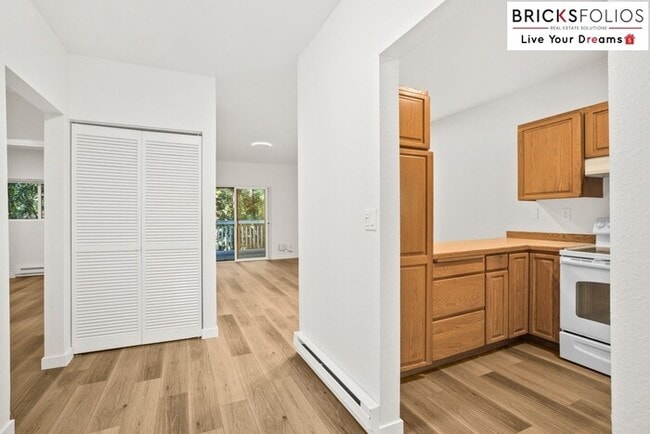Photo - Live Steps from Microsoft | Stylish 2BR Condo with Fireplace & Parking Unit Apartment C104