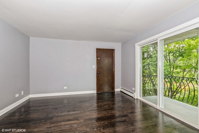 Photo - 7755 S Roberts Rd Condo Unit 5