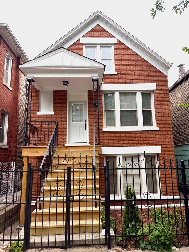 Building Photo - 2233 S Spaulding Ave