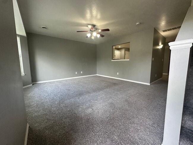 Photo - 2-Bedroom Townhome with Central AC and Covered Parking