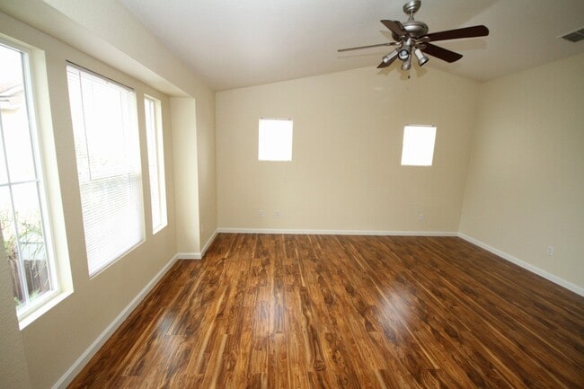 Photo - 4 Bed| 2.5 Bath | 2061 SF | 2 Car Garage | Long driveway with gate | Tenant pays $175 monthly for...