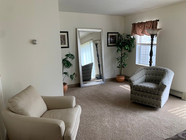 Sala de estar - Eastgate Apartments