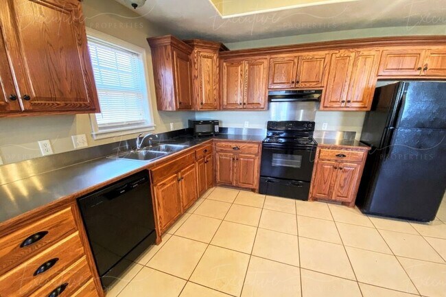 Photo - 2BR/2BA Duplex Near McNeese | W/D Included | Built-In Workspace