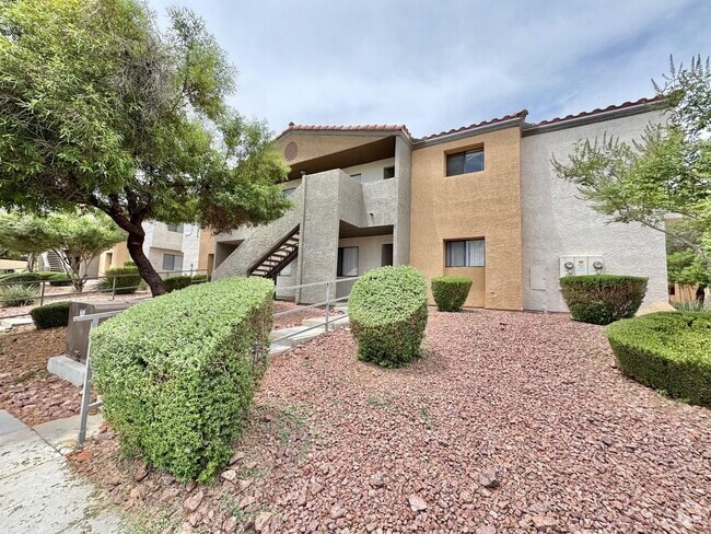 Building Photo - THIS SECOND-FLOOR DESERT SHORES CONDO OFFE...