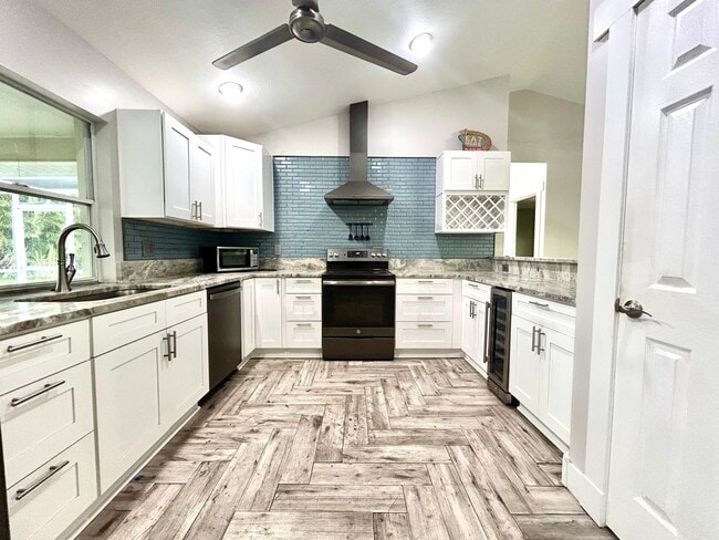 Photo - You will LOVE the beauty of this newly remodeled 3/2/2 pool home!