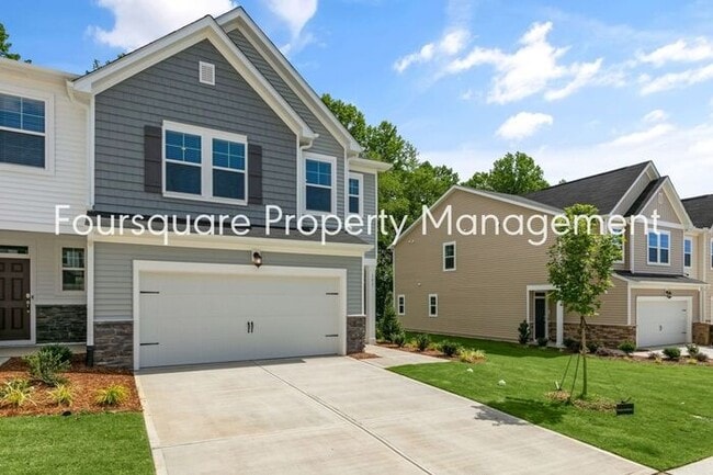 Photo - Spacious End-Unit Townhome with 2nd Floor Loft, Screened-In Porch & 2-Car Garage , High-Speed Int...