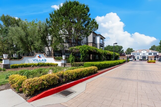 Gated Community Entrance and Signage at Villas at the Gardens Apartments - Villas at the Gardens
