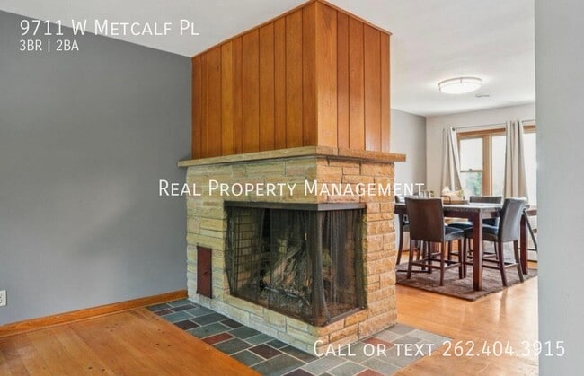9711 W Metcalf Pl