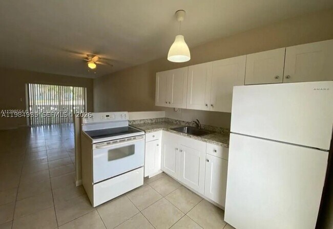 Building Photo - 1600 NE 114th St Unit 104