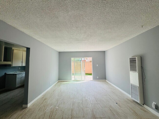 Building Photo - 1230 W 144th St Unit 2
