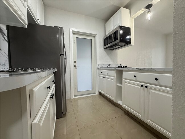 Photo - 4885 NW 4th St Unit FRONT