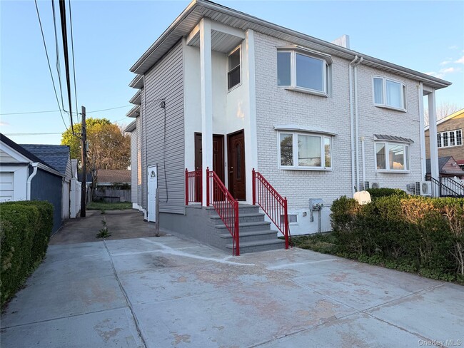 Building Photo - 239-13 86th Ave Unit 1st Floor