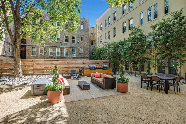Courtyard with seating area and grills