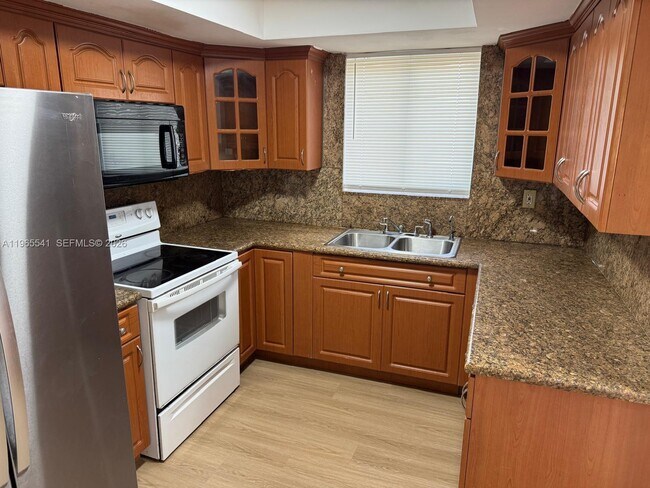 Photo - 7520 W 15th Ct