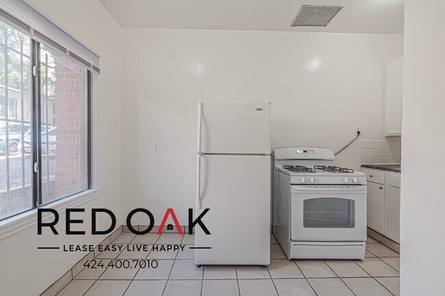 Photo - 2850 1/4 Leeward Ave-107 Unidad 107
