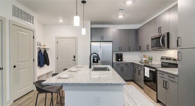 Building Photo - 1000 Rea Dr SW Unit 1204