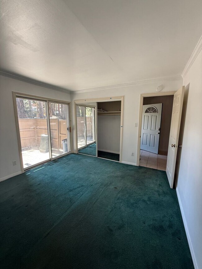 Photo - 3 Bed, 2 Bath Townhome with Vaulted Ceilings & Private Balcony