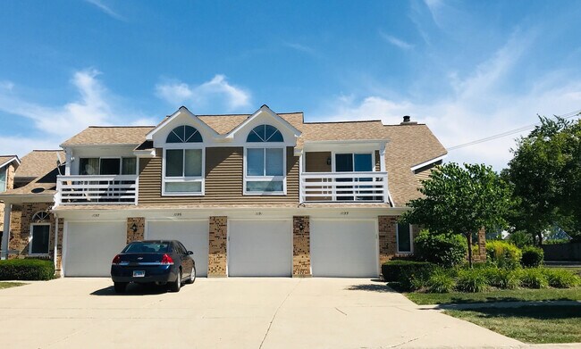 1 car Garage and Parking - 1191 Ranchview Ct Townhome