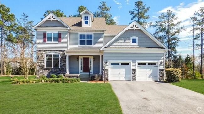 Building Photo - 5 Bedroom with screened porch Rental