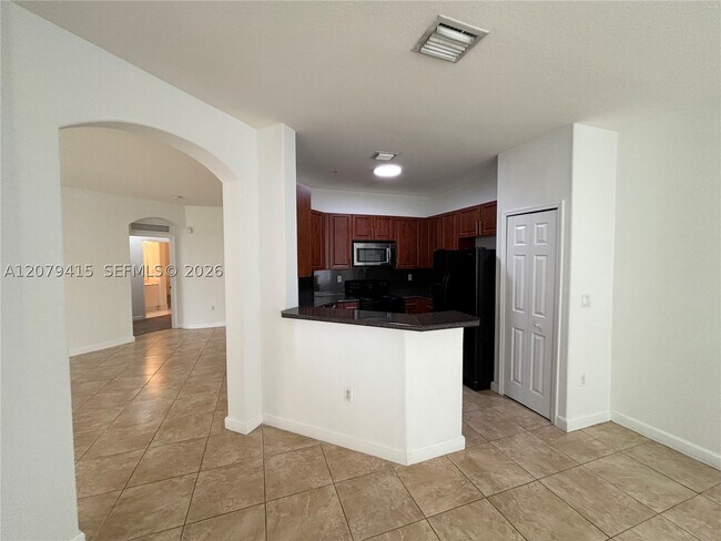 Building Photo - 10132 NW 7th St Unit 102