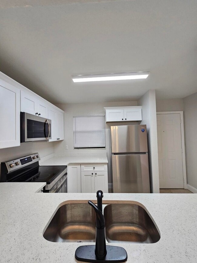 Photo - 1421 Windorah Way Unit E