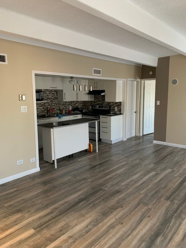 Building Photo - 9995 E Harvard Ave Unit 216