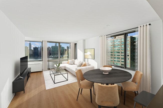 Renovated Package I dining and living room with hard-surface flooring