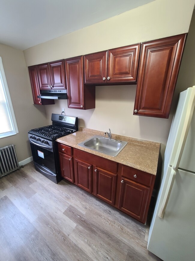 Building Photo - 6519 O'Donnell St Unit 2