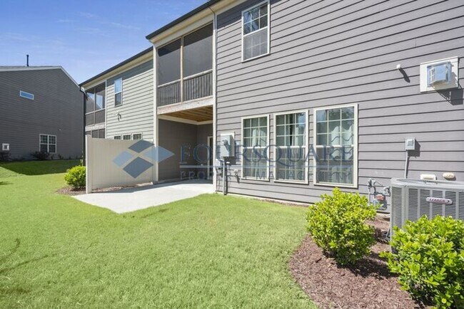 Photo - Elegant 3-Bed Townhome , Screened Porch & 2-Car Garage – Prime Davis Drive Location