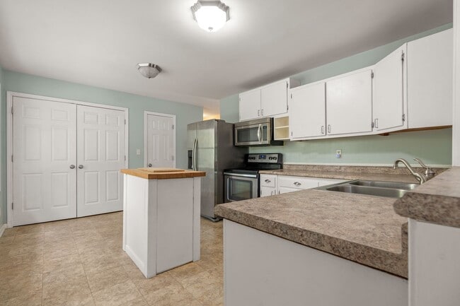 Photo - Ranch Three Bedrooms with Fenced in Yard Available April - Move in Ready!