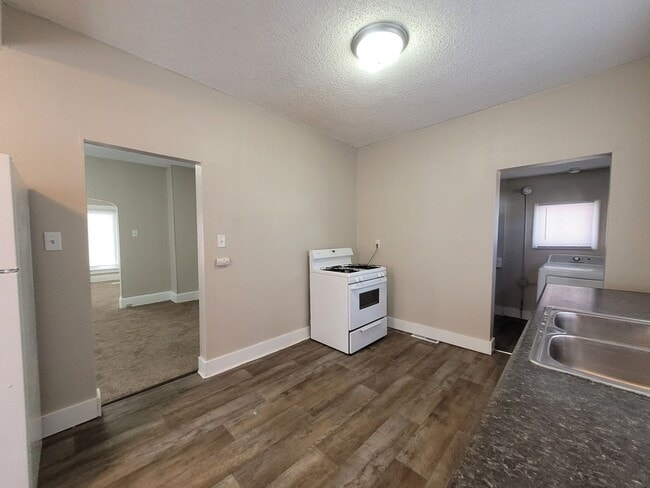 Photo - Two bedroom home with partially fenced yard!