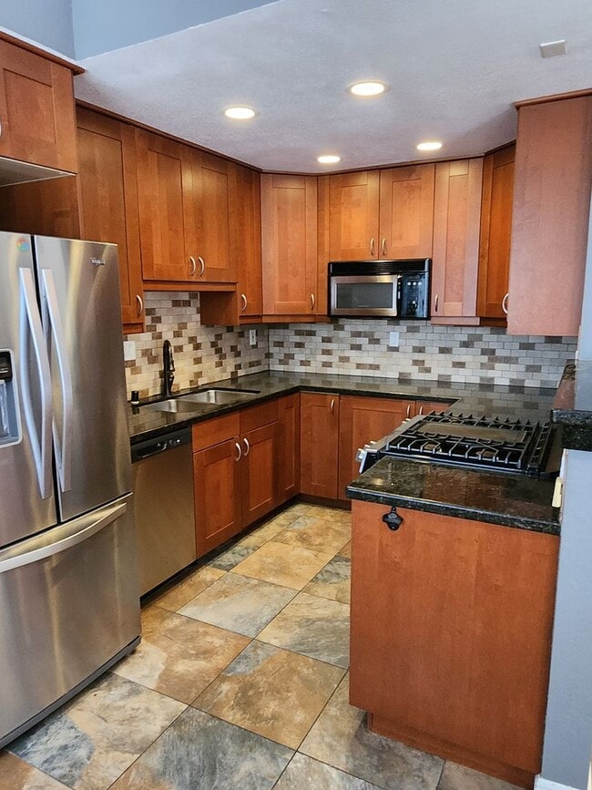 Building Photo - North Park 2 bedroom 2 bath condo with garage and 1 additional parking