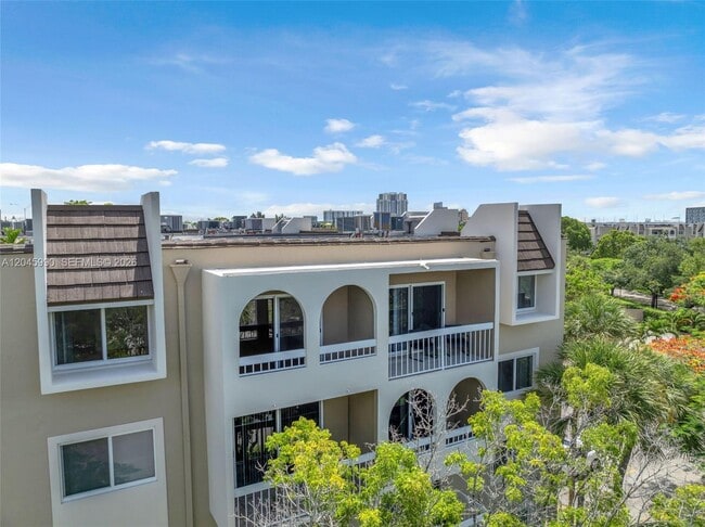 Building Photo - 8101 Camino Real Unit 402