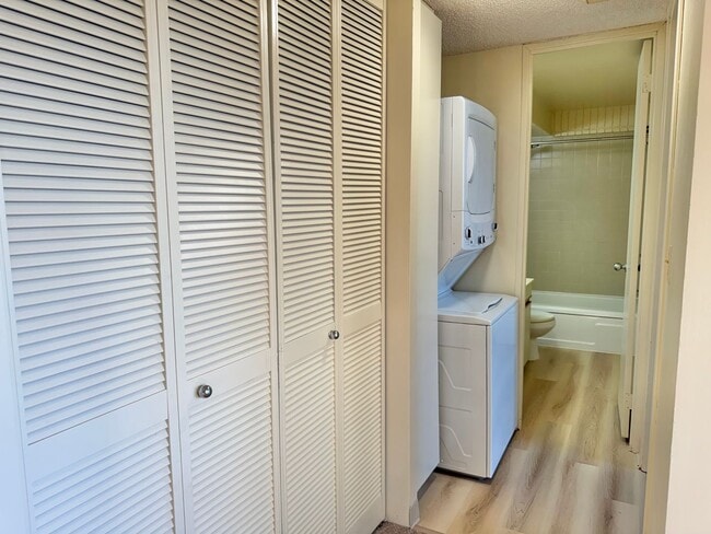 Photo - Charming 2 bed, 2 bath, with 1 secured covered parking stall and In-Unit Washer/Dryer. Available ... Unit 201