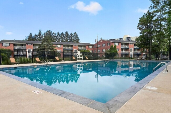 Dive into the serene oasis at Eagle Rock Apartments at Framingham. This stunning pool area offers a perfect retreat for relaxation and socializing. Don't miss your chance to elevate your lifestyle—schedule a tour today!