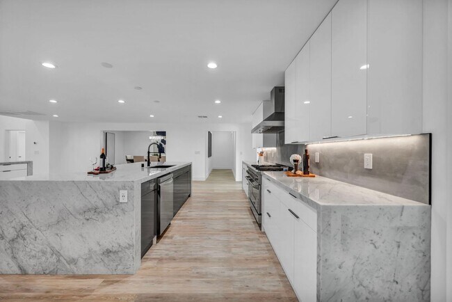 Photo - Meticulously renovated single-story contem...