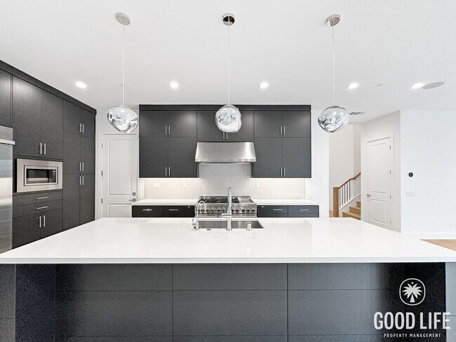 Photo - Luxury 5-Bedroom Home with Walk-In Closets, Modern Kitchen & Community Pool