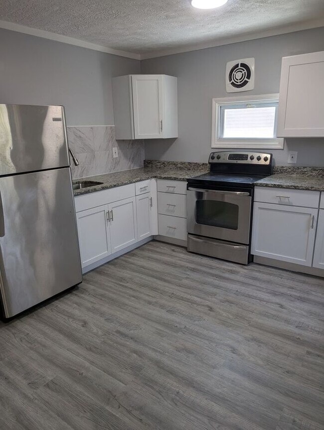 Photo - Spacious 5BR 2BA SFR w/ In-Unit W/D • Off Street Parking in Euclid