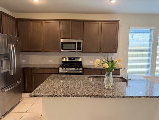 Photo - 8711 Windsong Trail Dr