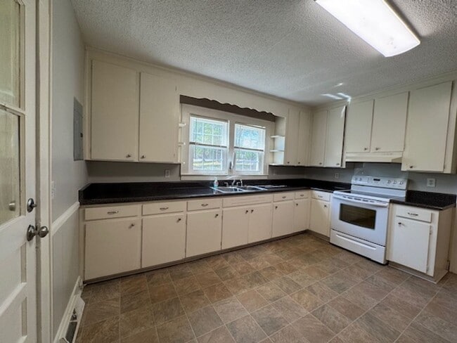 Photo - Cute Bungalow home with hardwoods - 2 bedrooms, 1 full bath - nice size yard