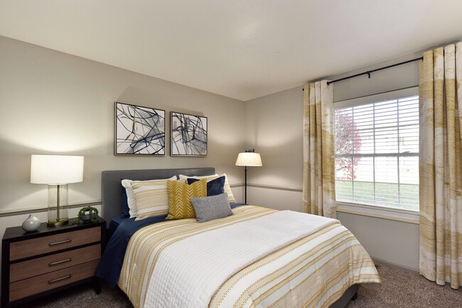 Experience the tranquility and comfort of this beautifully designed bedroom. - Everly at Meridian Hills
