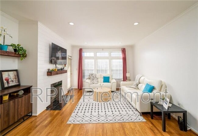 Building Photo - 220 Renaissance Pkwy NE Unit 1207