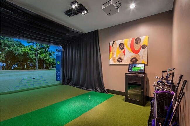 Work on your skills with our virtual golf system with swing analyzer and variety of world-class courses - Malden Square Apartments