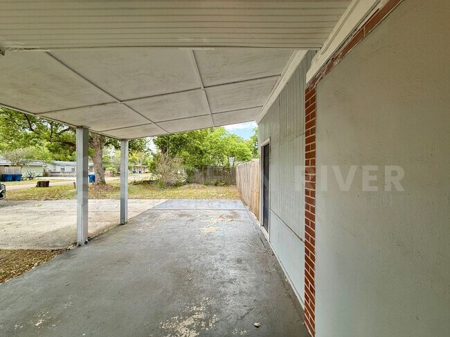 Photo - Fully Renovated 2BR Brick Home with Vaulted Ceilings & Backyard Retreat!