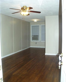 Original hardwood floors, ceiling fans, etc - 420 Moss St Unit Apt A