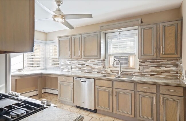 Photo - Designer-Inspired 3 Bedroom, 2 Bath Home With Finished Basement & In-Ground Pool