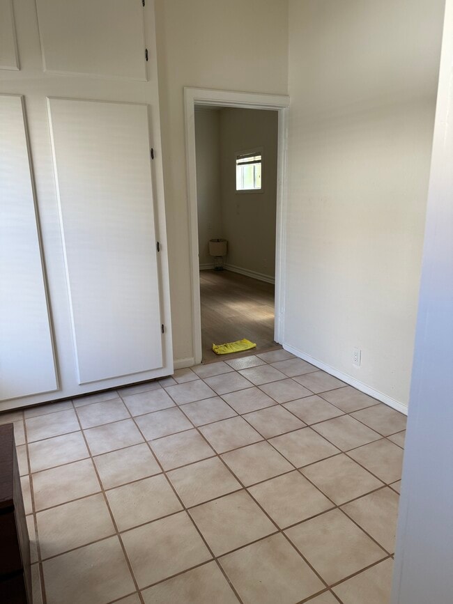 view of kitchen towards one of the rooms - 305 Emerald St Unit 305