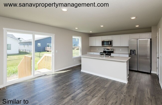 Photo - Beautiful 4BR/2.5BA Home Featuring Open-Concept Living & Modern Upgrades