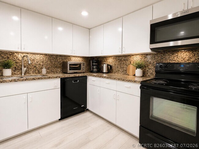 Photo - 401 Golden Isles Dr Unit 402
