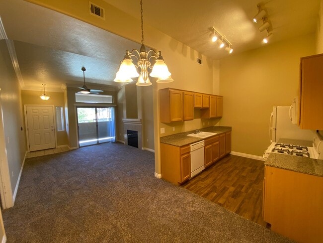 Building Photo - All NEW flooring in this spacious 3-bedroo... Rental